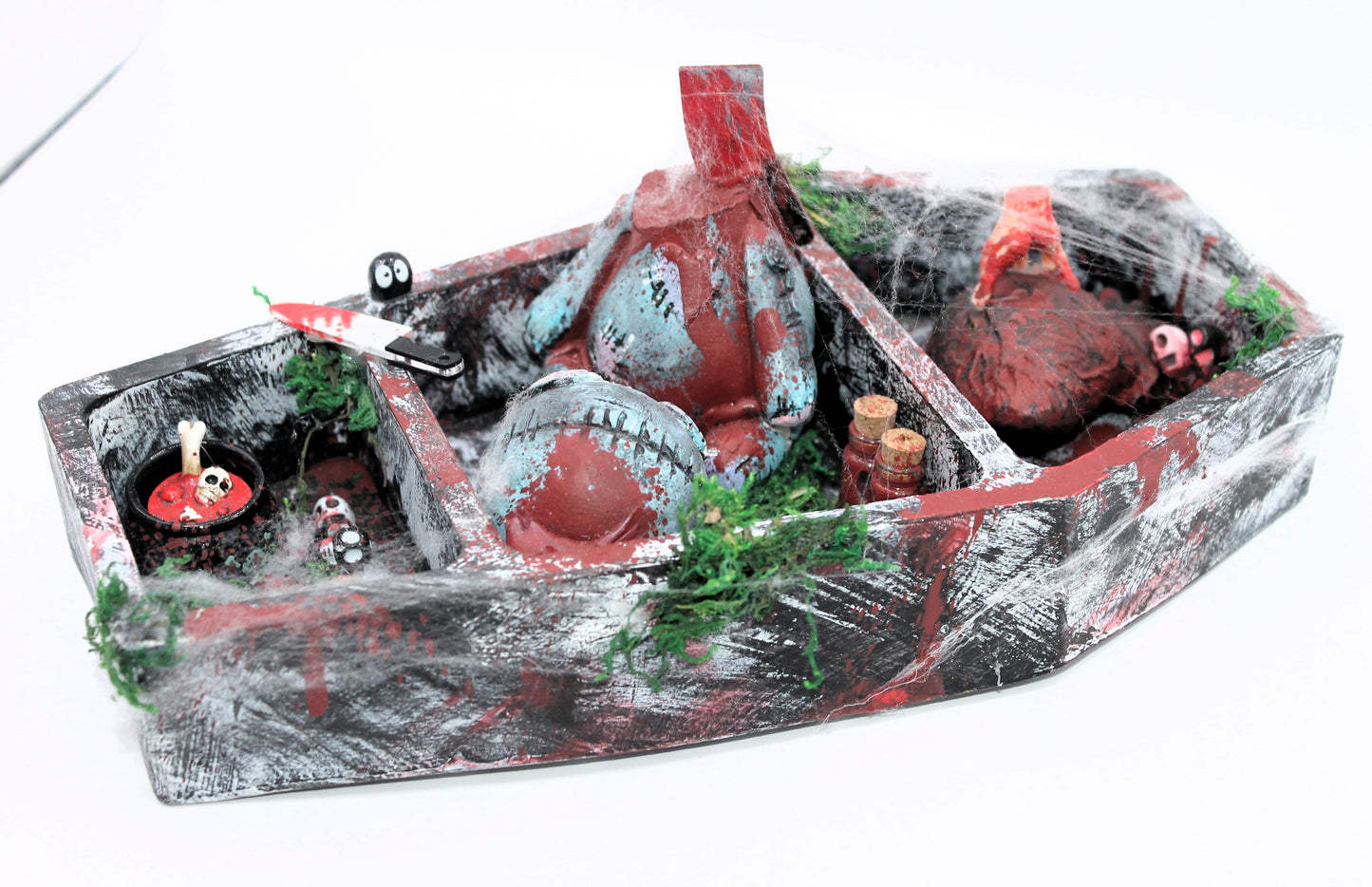 The Butcher's Barge coffin curse doll murder scene