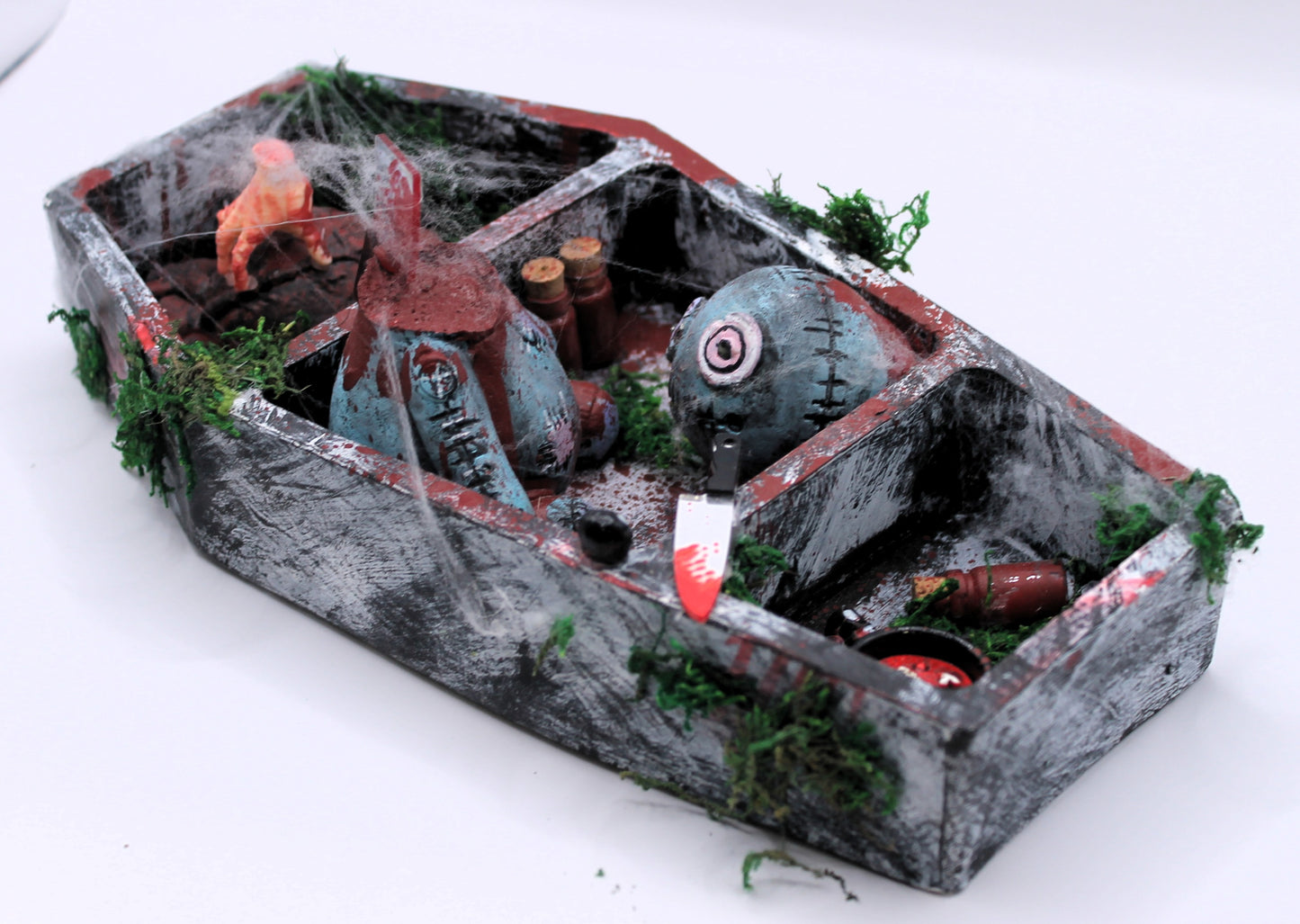 The Butcher's Barge coffin curse doll murder scene
