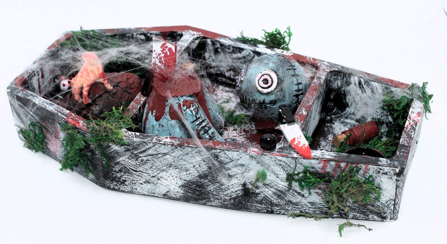 The Butcher's Barge coffin curse doll murder scene