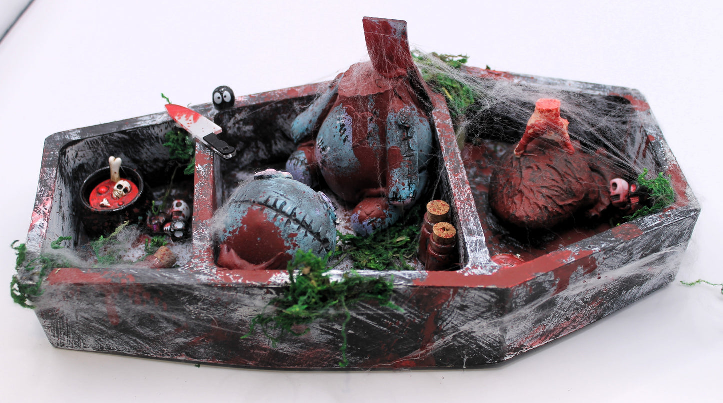 The Butcher's Barge coffin curse doll murder scene