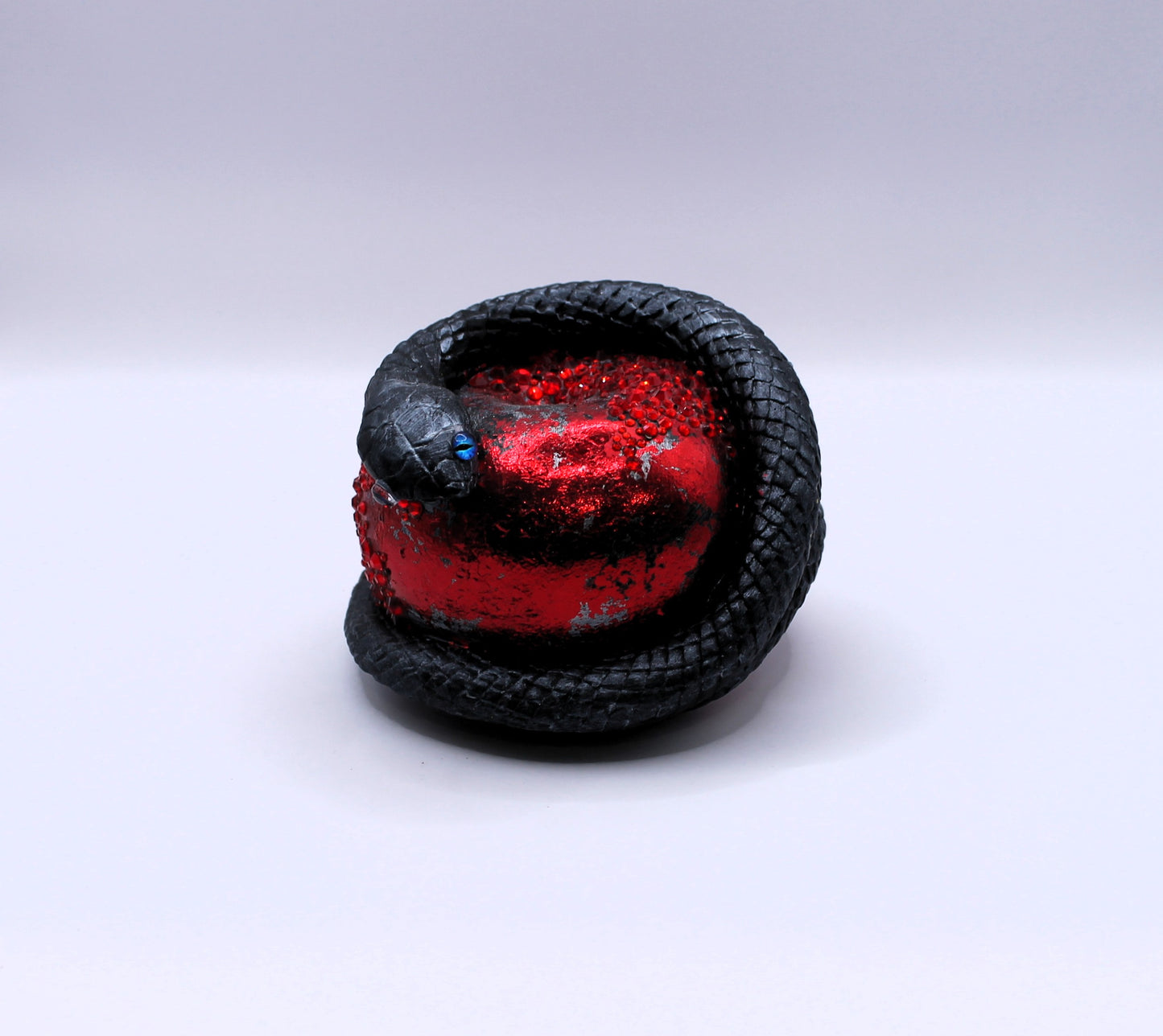 Bite of Envy snake and apple decor