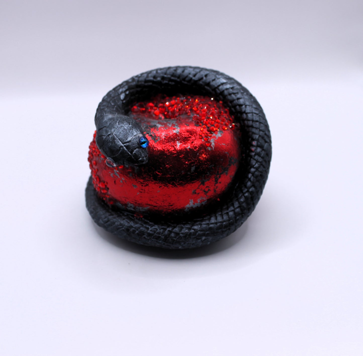 Bite of Envy snake and apple decor