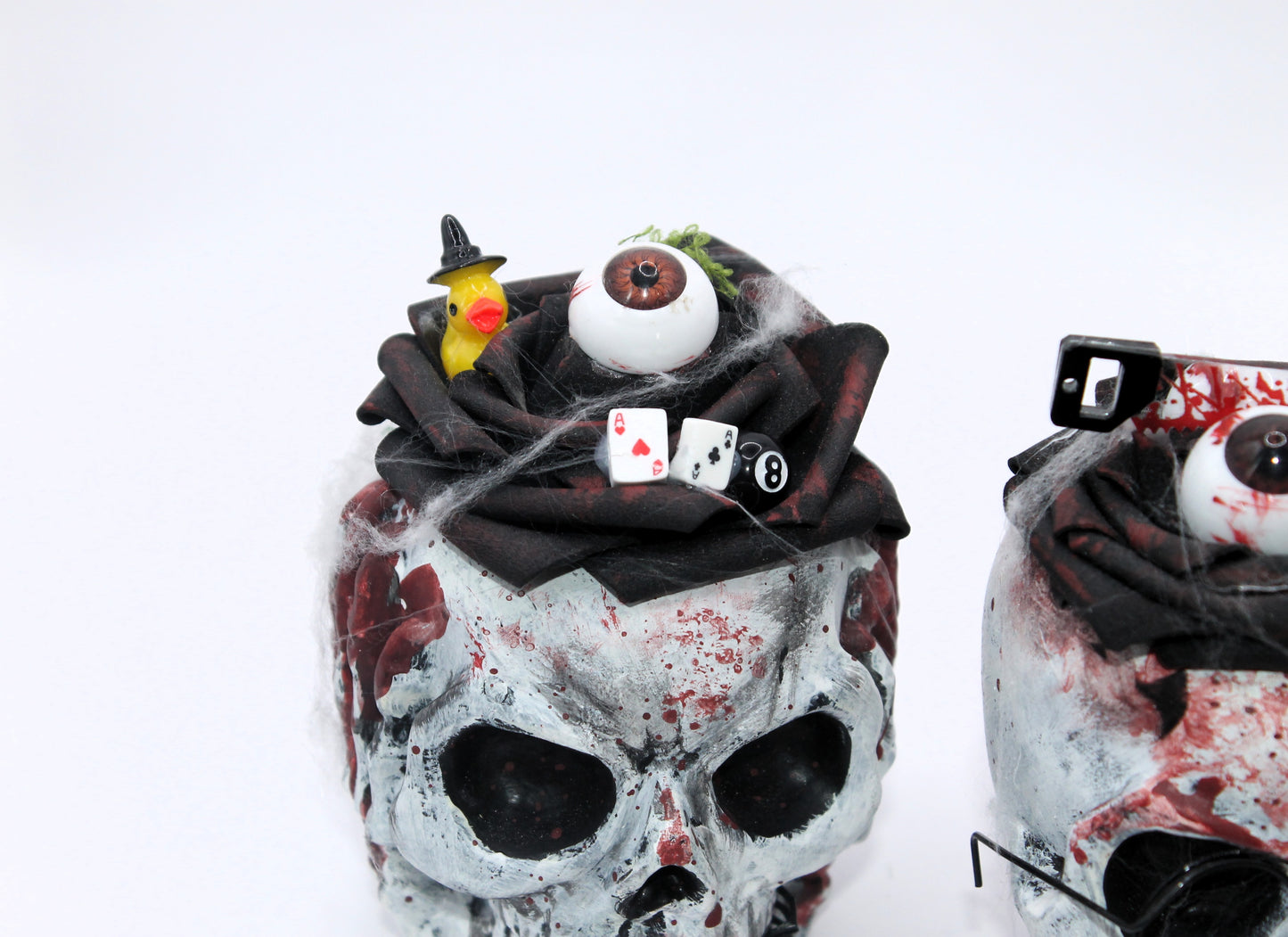 The Unholy Trio skull heads