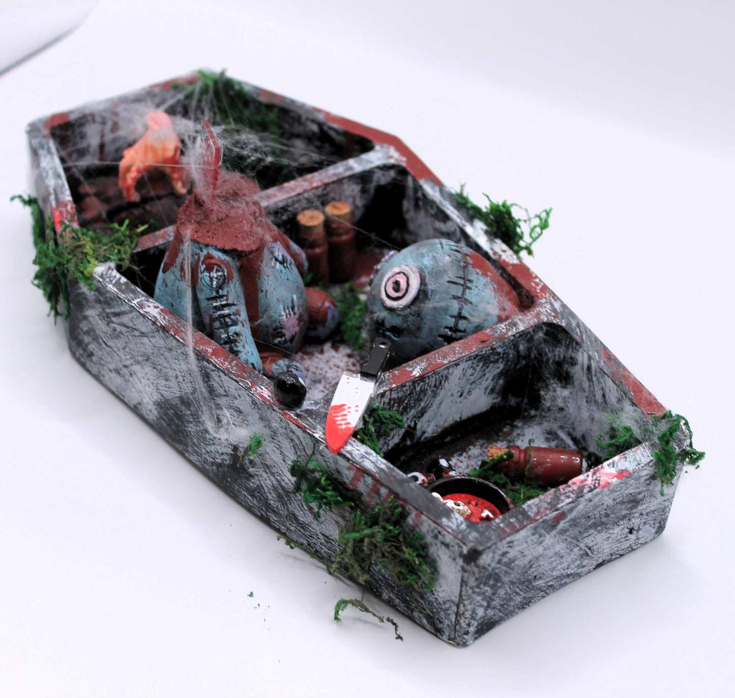 The Butcher's Barge coffin curse doll murder scene
