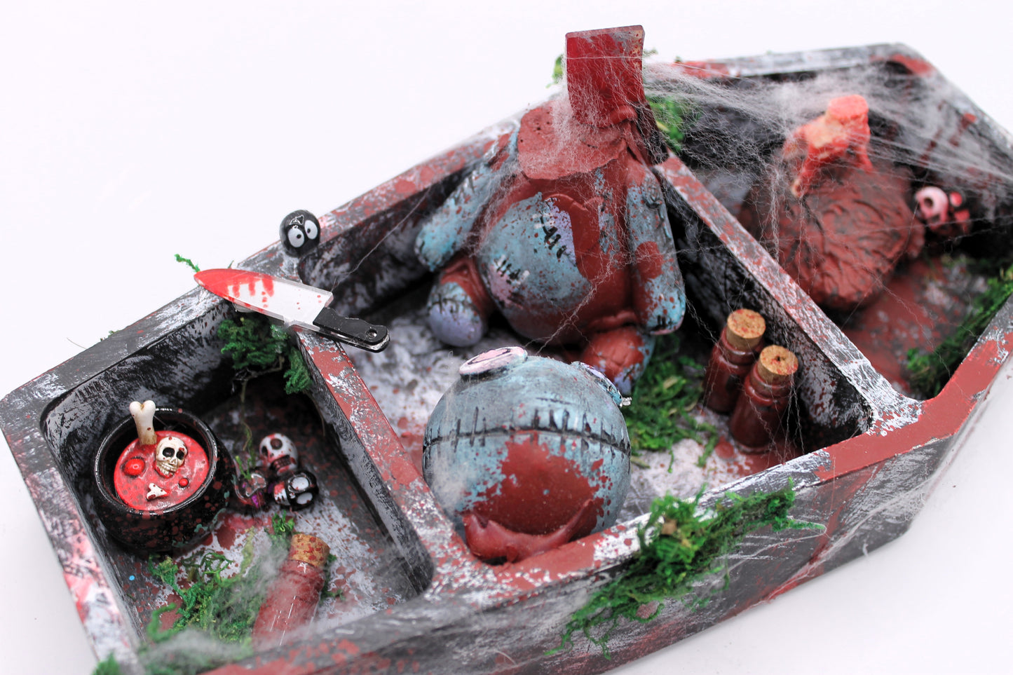 The Butcher's Barge coffin curse doll murder scene
