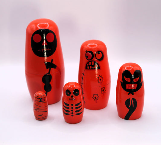 Beasts of Boo-ville Nesters stack a dolls