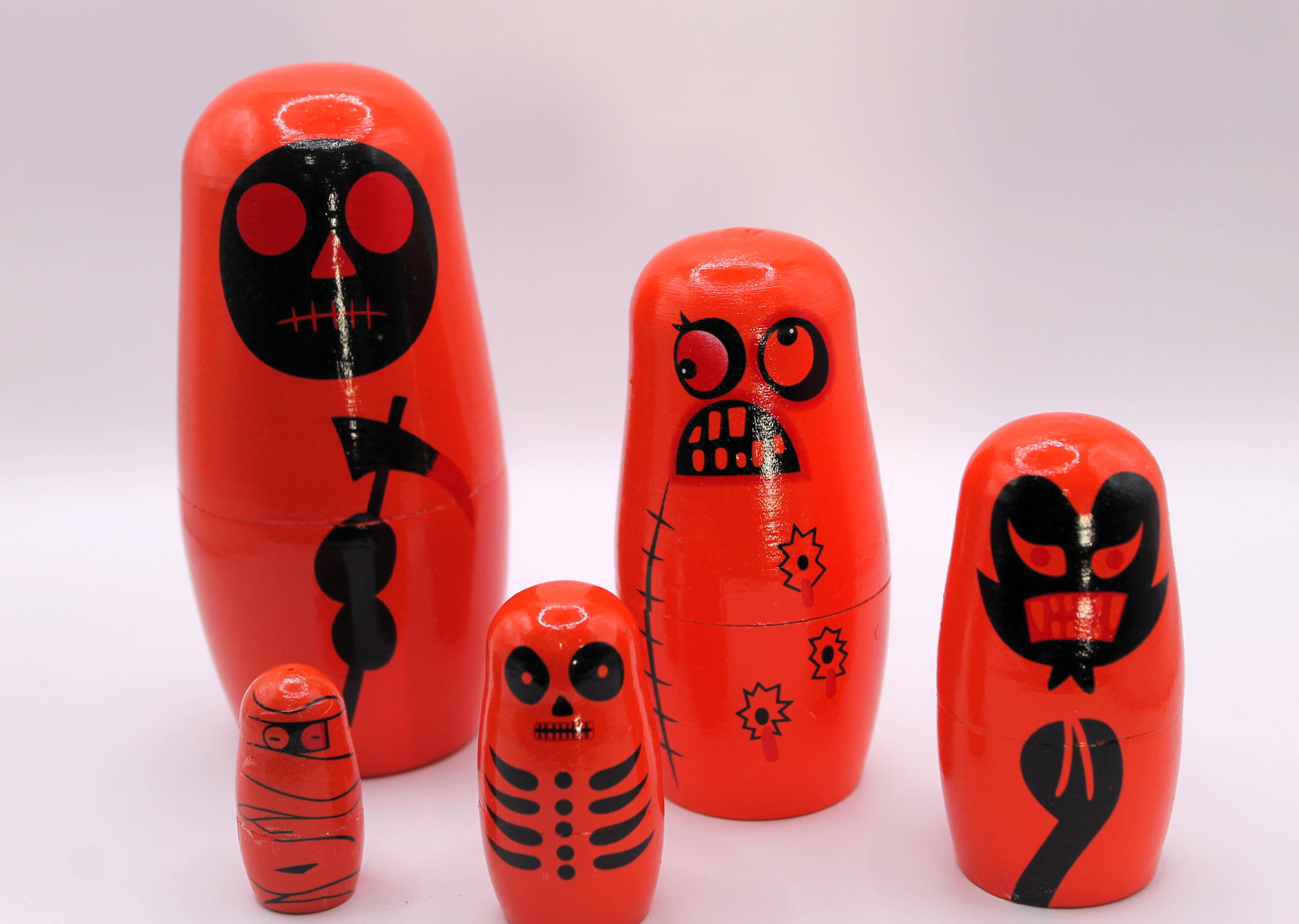 Beasts of Boo-ville Nesters stack a dolls