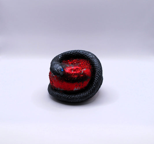 Bite of Envy snake and apple decor