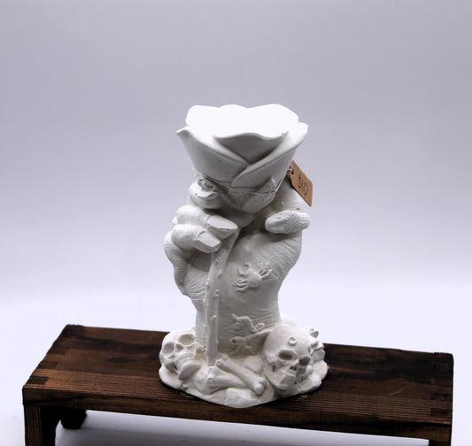 witches hand holding a rose plaster raw mold